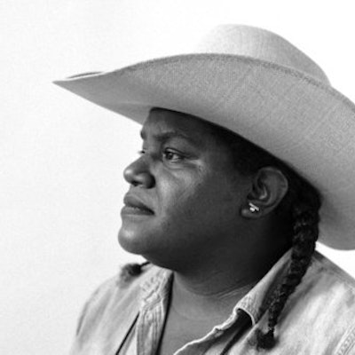 portrait photo of DéLana R. A. Dameron