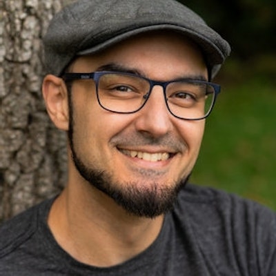 portrait photo of Christopher Roubique