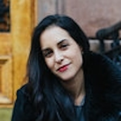 portrait photo of Alexis Coe
