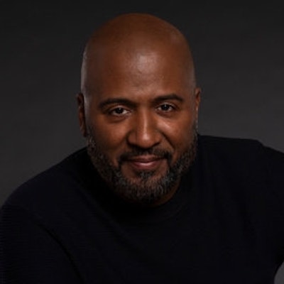 portrait photo of Malcolm D. Lee