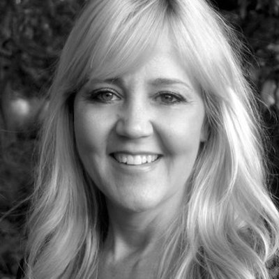 portrait photo of Andrea Raynor