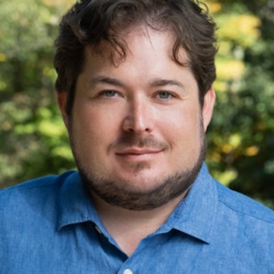 portrait photo of Geoffrey Cain