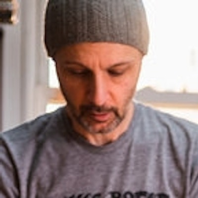 portrait photo of Andrew Janjigian