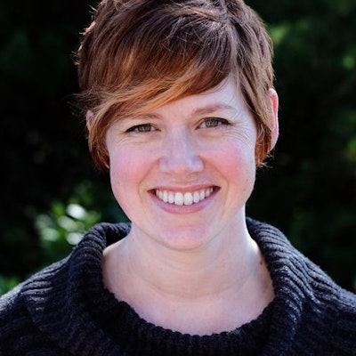 portrait photo of Amy Hevron