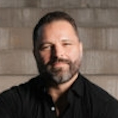 portrait photo of Brett Bartholomew