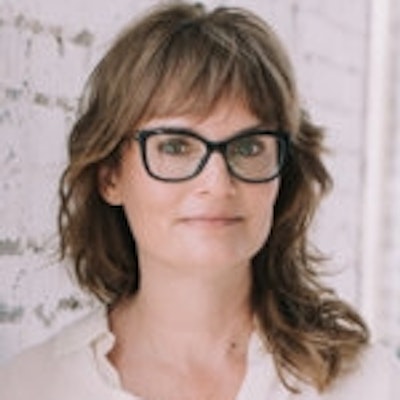 portrait photo of Kelly E. Hill