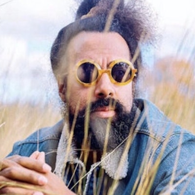 portrait photo of Reggie Watts