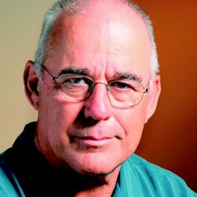 portrait photo of John Saul
