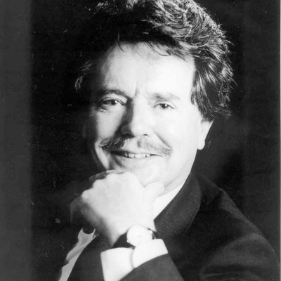 portrait photo of Norman Sherry