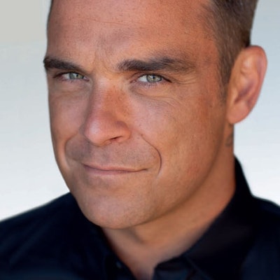 portrait photo of Robbie Williams