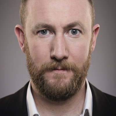 portrait photo of Alex Horne