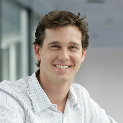 portrait photo of Andrew Charlton