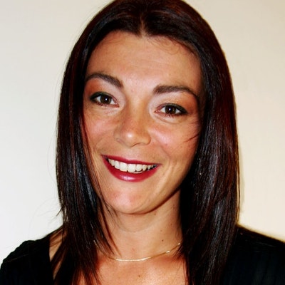 portrait photo of Kelly Denley