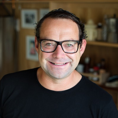 portrait photo of Michael Van de Elzen