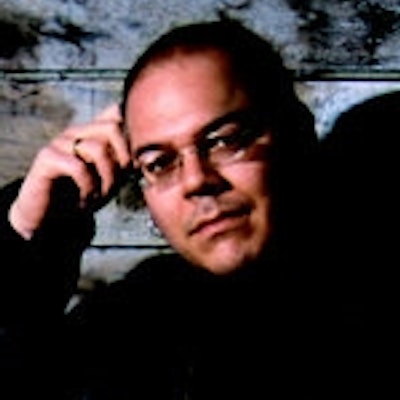 portrait photo of Greg Rucka