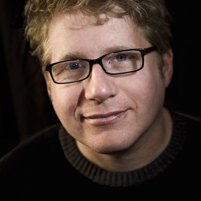 portrait photo of Josh Neufeld