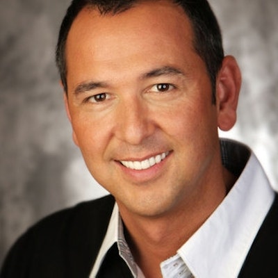 portrait photo of Kenny Luck