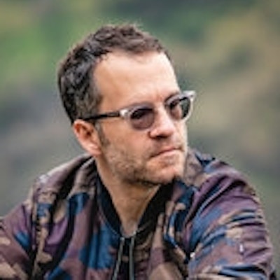 portrait photo of Tom Bissell
