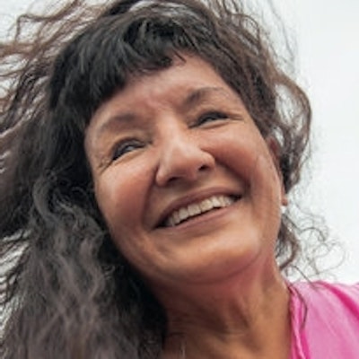 portrait photo of Sandra Cisneros