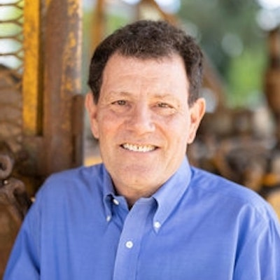portrait photo of Nicholas D. Kristof