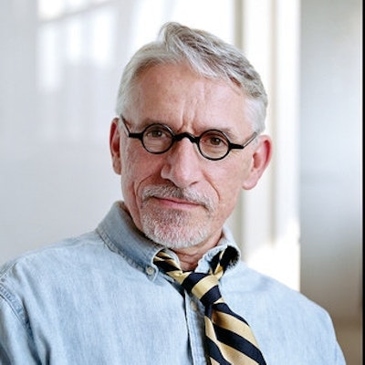 portrait photo of Kenneth C. Davis