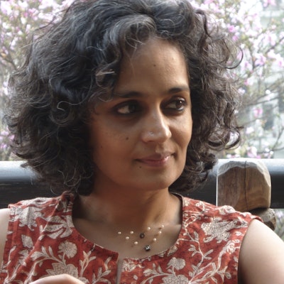 portrait photo of Arundhati Roy