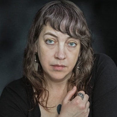 portrait photo of Leela Corman