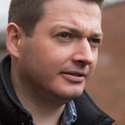 portrait photo of Aaron Edwards
