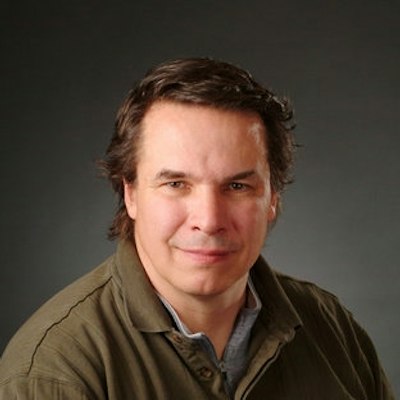 portrait photo of Greg Mortenson