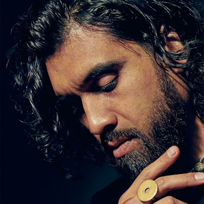 portrait photo of Omar Musa